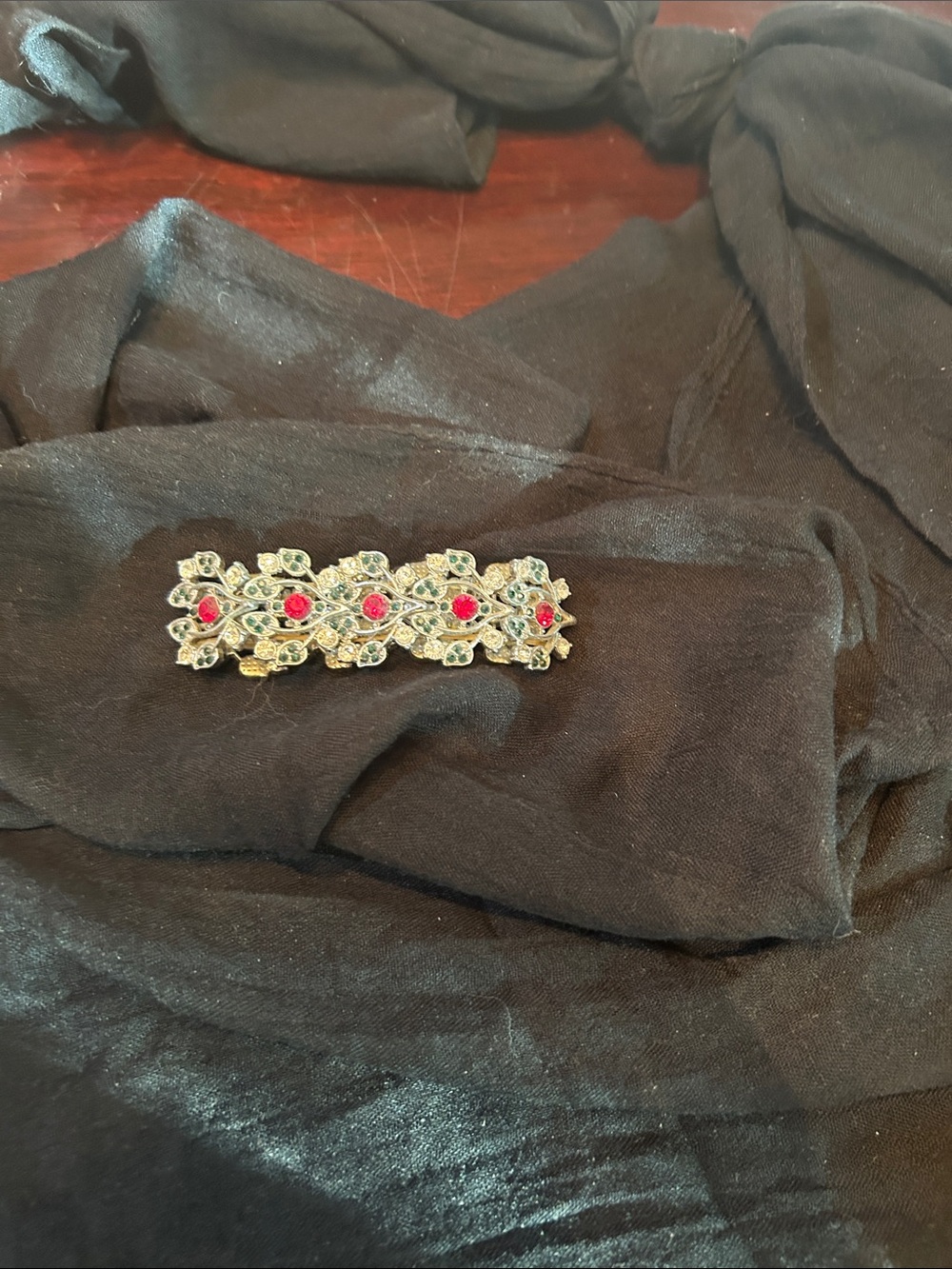 Charming Charlie Gold-Tone Brooch with Red and Green Stones
